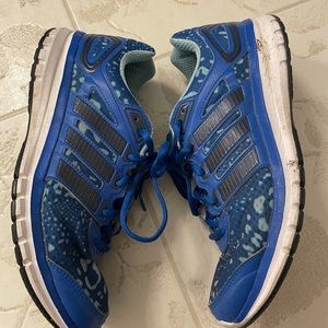 blue adidas tennis shoes